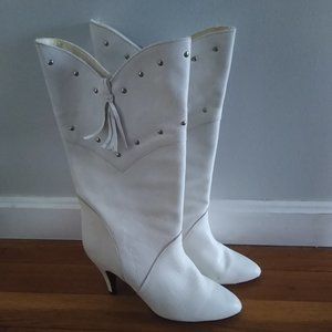 White vintage leather boots .